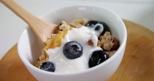 Healthy Granola with Fresh Blueberries and Yogurt in Bowl - Download Free Stock Images Pikwizard.com