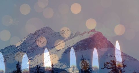 Holiday Serenity: Candles with Scenic Winter Mountains - Download Free Stock Images Pikwizard.com