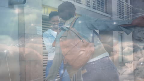 Joyful African American Twins Capturing Moments with Technology