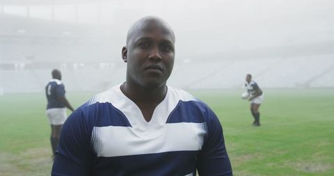 African American Rugby Players on Misty Field in Intense Atmosphere - Download Free Stock Images Pikwizard.com