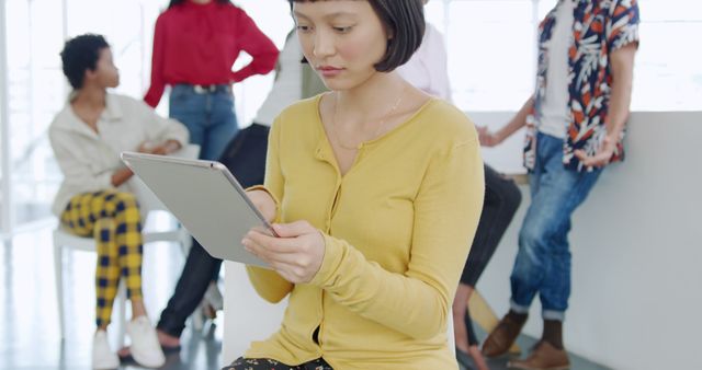 Businesswoman Using Digital Tablet in Modern Office Collaboration - Download Free Stock Images Pikwizard.com