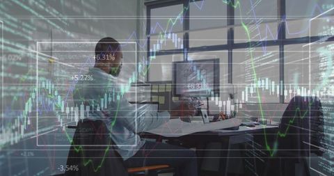 Businessman Analyzing Financial Data and Charts in Modern Office - Download Free Stock Images Pikwizard.com