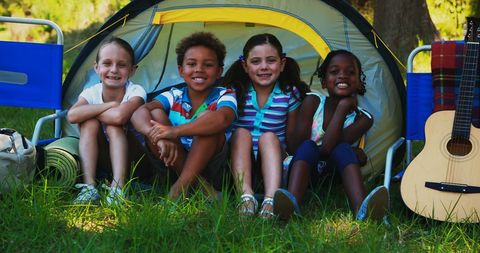Joyful Children Enjoying Camping Adventure Together
