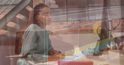 Innovative Businesswoman Analyzing Digital Data in Modern Workspace