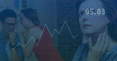 Professional Businesswoman in Office Setting with Data Display and Colleagues