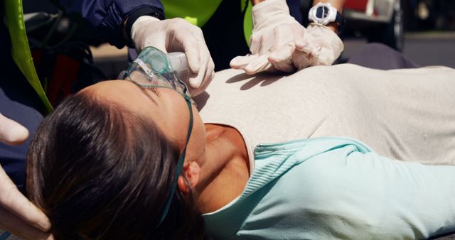 Emergency Medical Team Attending to Unconscious Woman - Download Free Stock Images Pikwizard.com