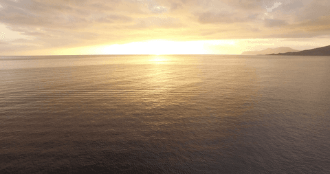transparent coastal sunset over serene ocean waters - Download Free Stock Videos Pikwizard.com