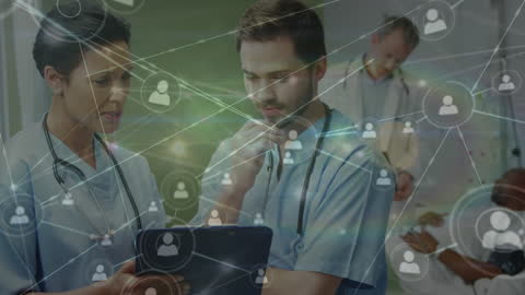 Healthcare Professionals Analyzing Digital Network Data in Hospital