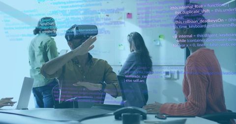 Mixed reality team collaborating with vr headset and live code overlay in glass office