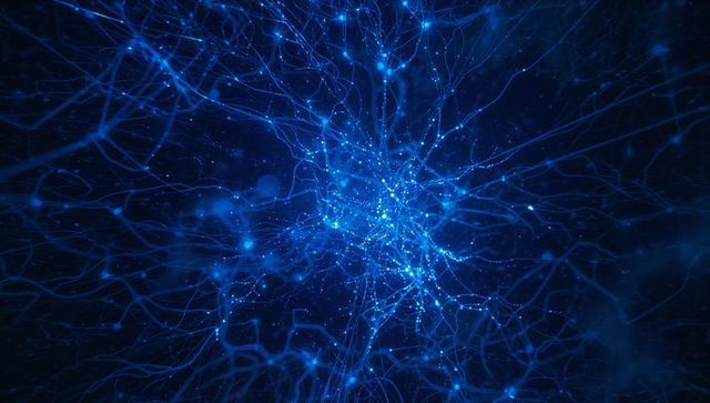 Futuristic digital network with blue filaments and glowing nodes