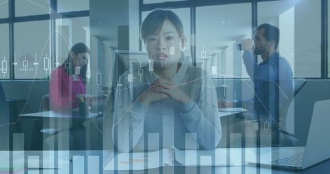 Businesswoman Engaged in Online Meeting with Data Overlay