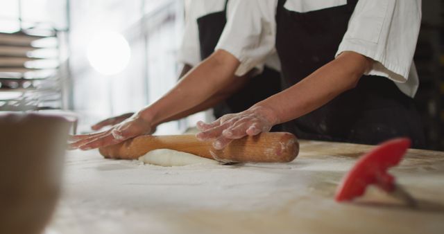 Hands Rolling Dough in Rustic Bakery - Download Free Stock Images Pikwizard.com