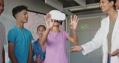 Diverse Students Experiencing VR in Educational Tech Lab