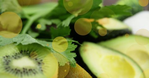 Fruits and greens abstract with yellow spots overlay