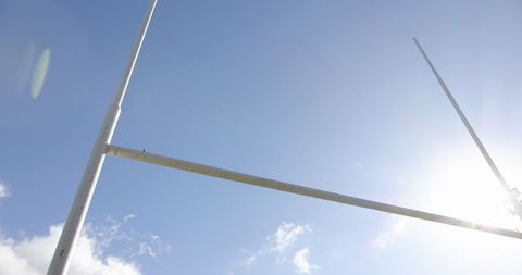 Minimalist Football Goalpost Against Clear Blue Sky