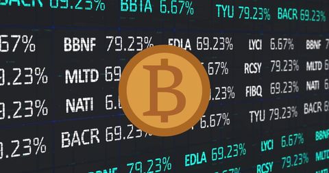 Bitcoin Logo Over Stock Market Display Showing Financial Trends