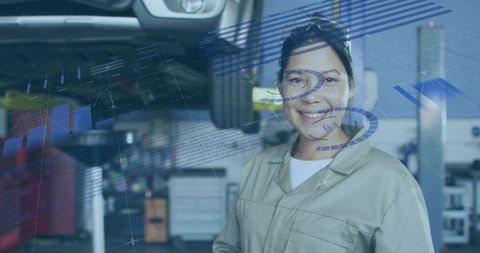 Female mechanic inspecting car undercarriage with ar diagnostics in modern garage