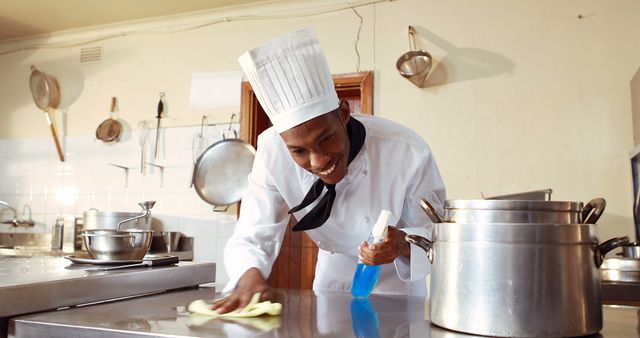 Chef Cleaning Kitchen Counter in Restaurant - Download Free Stock Images Pikwizard.com