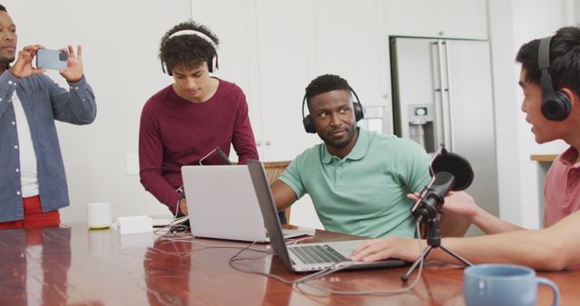 Diverse Podcasters with Headphones Recording Conversation at Home Studio - Download Free Stock Images Pikwizard.com