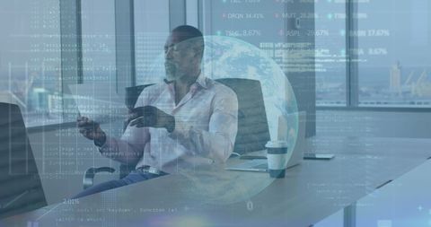 Businessman analyzing financial data with digital interface overlay
