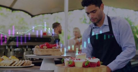 Barista arranging cupcakes and berry tart at outdoor market counter with analytics overlay