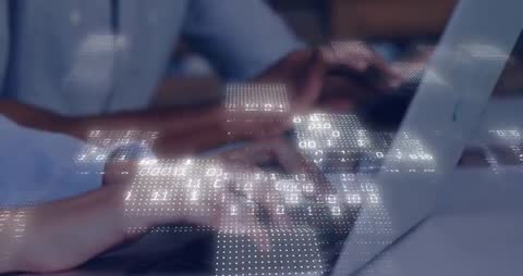 Hands Typing Laptop with Binary Code Overlay Displaying Technology Themes