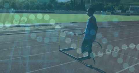 Athlete with Prosthetic Leg Training on Track with Data Overlay