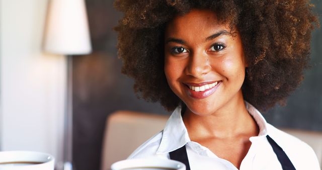 Smiling Barista Holding Coffee Cups in Cafe - Download Free Stock Images Pikwizard.com