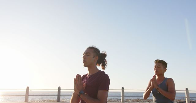 Two Men Practicing Outdoor Yoga at Sunrise on Seaside Pier - Download Free Stock Images Pikwizard.com