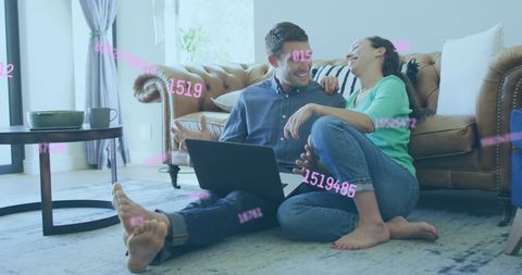 Couple Bonding with Laptop in High-Tech Living Room