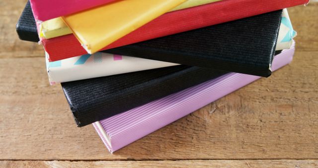 Colorful Textbooks Arranged on Wooden Table Close-Up - Download Free Stock Images Pikwizard.com