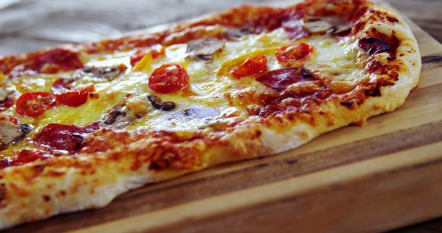 Freshly Baked Crispy Crust Pepperoni Pizza with Cherry Tomatoes - Download Free Stock Images Pikwizard.com