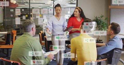 Diverse Team Collaborating with Social Media Notifications Overlay