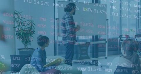 Diverse Business Team Discussing Work with Stock Market Interface