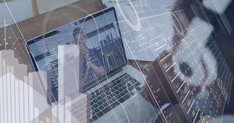 Businessman Analyzing Digital Data on Laptop at Desk