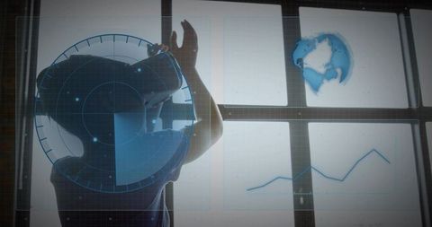Child wearing vr headset exploring augmented hud with globe, radar and data chart overlay
