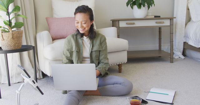 Young Woman Working from Home Sat on Floor with Laptop - Download Free Stock Images Pikwizard.com