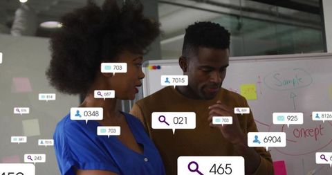 Coworkers Analyzing Digital Strategy with Data Overlays