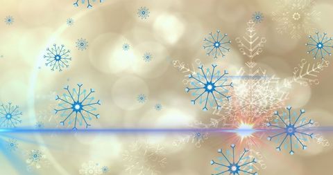 Abstract blue snowflakes on glowing background for festive celebrations
