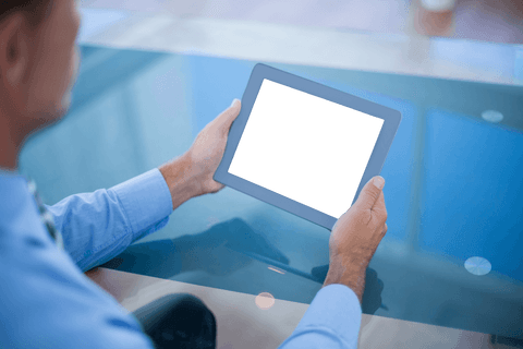 Businessman Holding Transparent Tablet Screen in Modern Office - Download Free Stock Videos Pikwizard.com