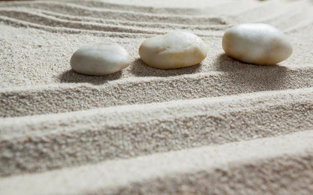 White pebble stone on a sand