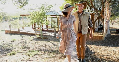 Caucasian Couple Enjoying a Sunny Outdoor Stroll