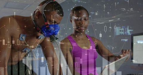Athlete undergoing metabolic and respiratory testing with mask, electrodes and tablet data