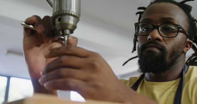 Craftsman Using Drill Press in Workshop - Download Free Stock Images Pikwizard.com