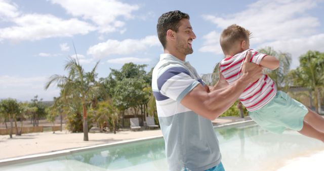 Father Playing With Son Near Outdoor Swimming Pool - Download Free Stock Images Pikwizard.com