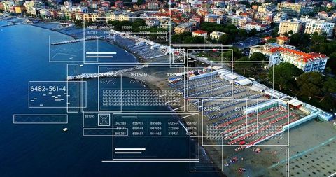 Aerial resort beach with augmented reality overlay mapping umbrellas, sunbeds, loungers