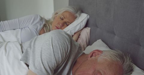Senior Couple Sleeping Peacefully in Cozy Bedroom - Download Free Stock Images Pikwizard.com