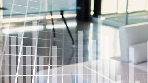 Blurred Office with Overlaying Financial Graph Conceptual Background