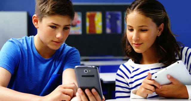 Teenagers Using Digital Tablets in Classroom - Download Free Stock Images Pikwizard.com