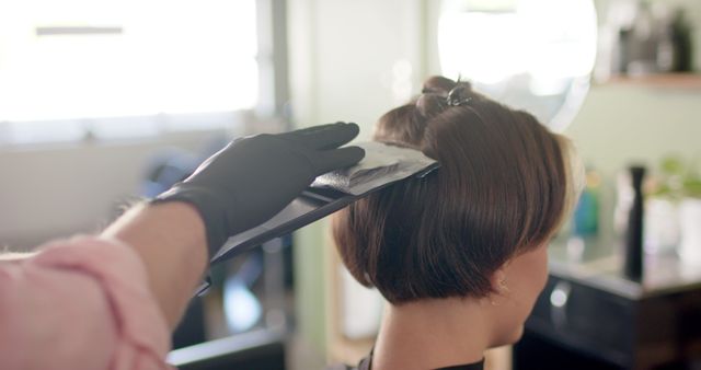 Hairdresser Applying Dye to Client's Hair - Download Free Stock Images Pikwizard.com